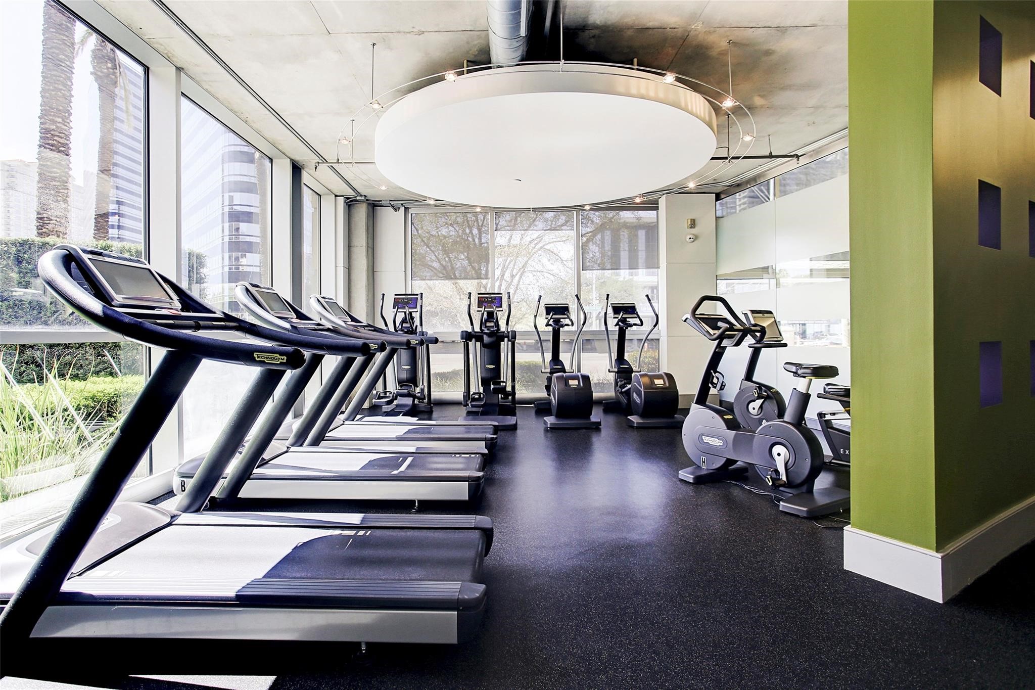 1901 Post Oak Boulevard, Unit 3502 Houston, TX 77056 - Photo 13 of 14 a view of a room with gym equipment