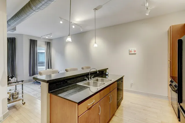 an aerial view of a house with swimming pool