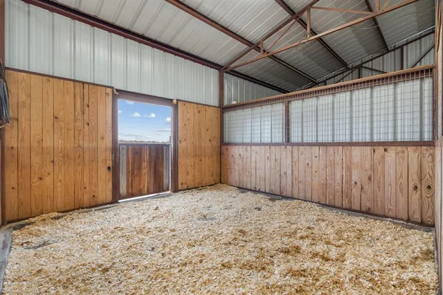 a view of a terrace with wooden fence