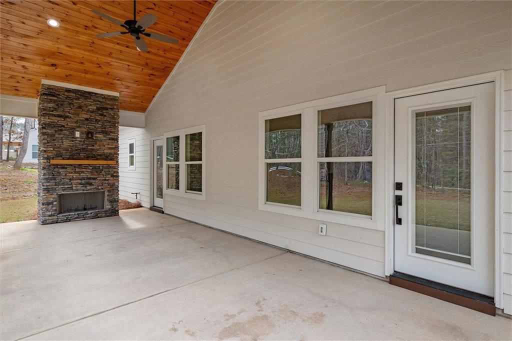 6093 Wayfarer Drive Villa Rica, GA 30180 - Photo 36 of 70 a view of an empty room with a fireplace