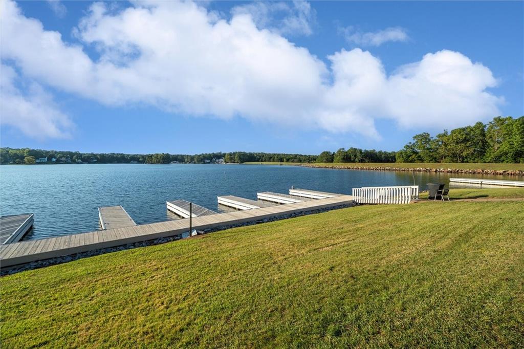 6093 Wayfarer Drive Villa Rica, GA 30180 - Photo 59 of 70 a view of a lake with houses in the back
