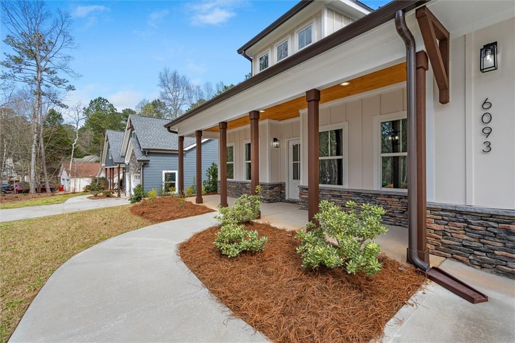 6093 Wayfarer Drive Villa Rica, GA 30180 - Photo 7 of 70 a front view of a house with garden