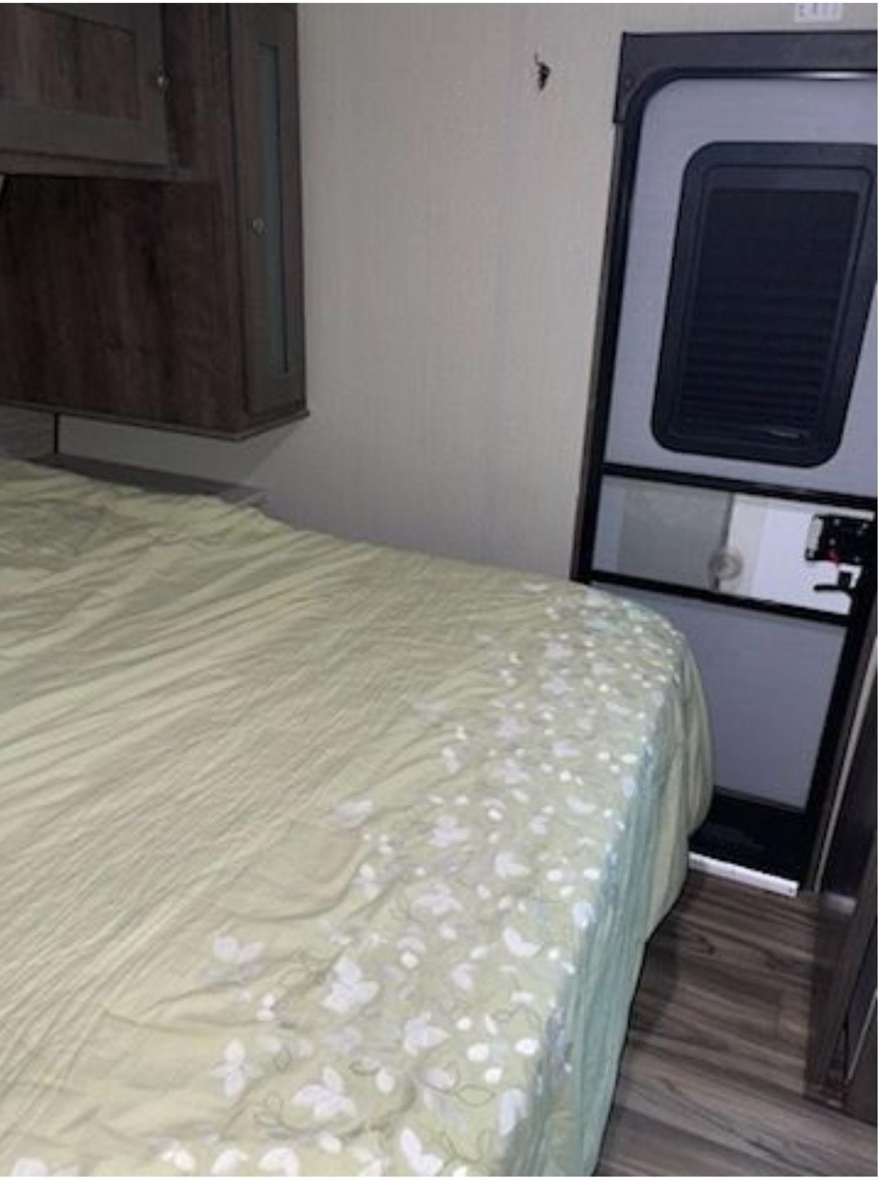 669 Highway 9 Cape May, NJ 08204 - Photo 15 of 18 a bedroom with a bed and a mirror