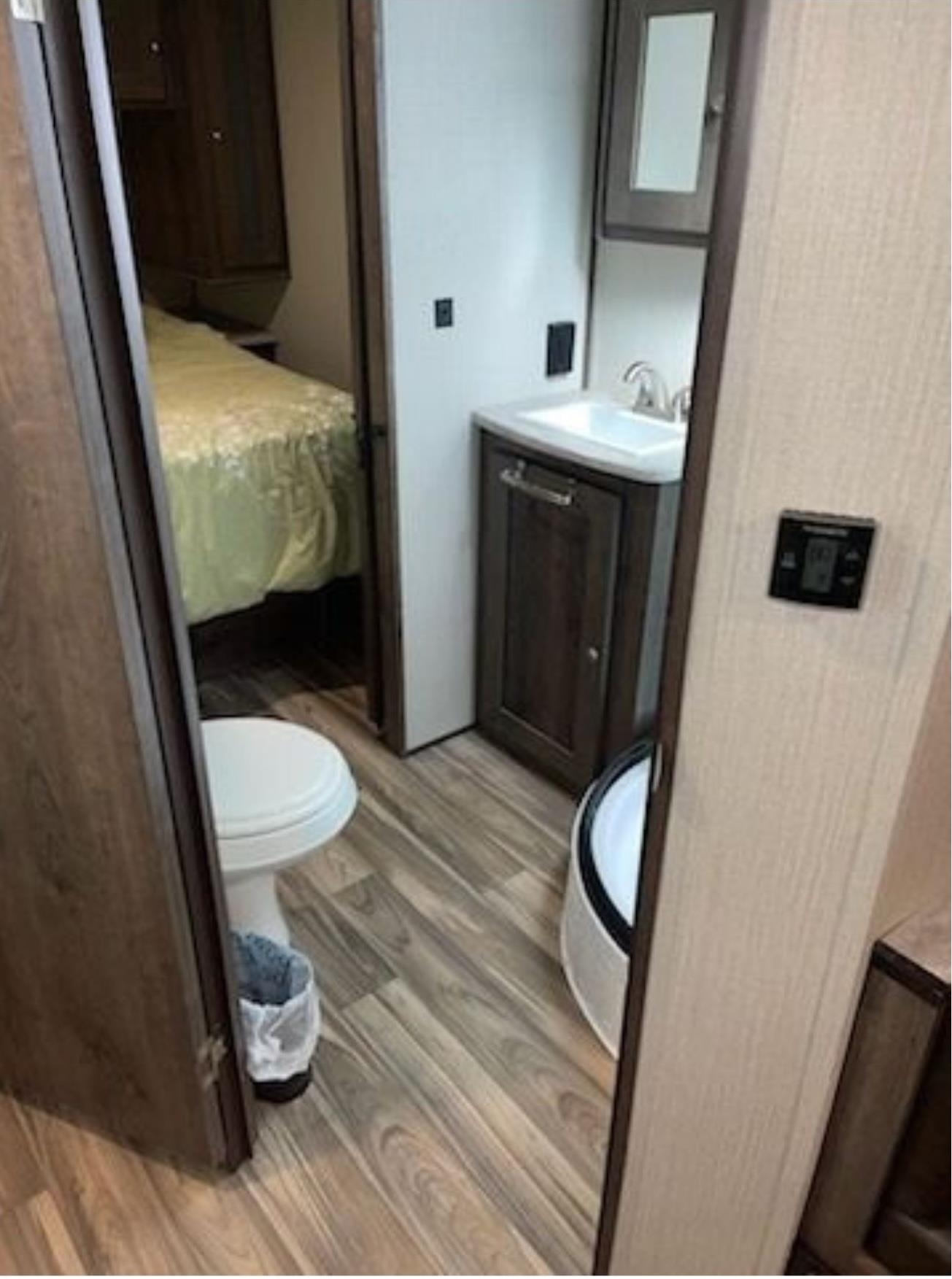 669 Highway 9 Cape May, NJ 08204 - Photo 18 of 18 a bathroom with a sink and a mirror