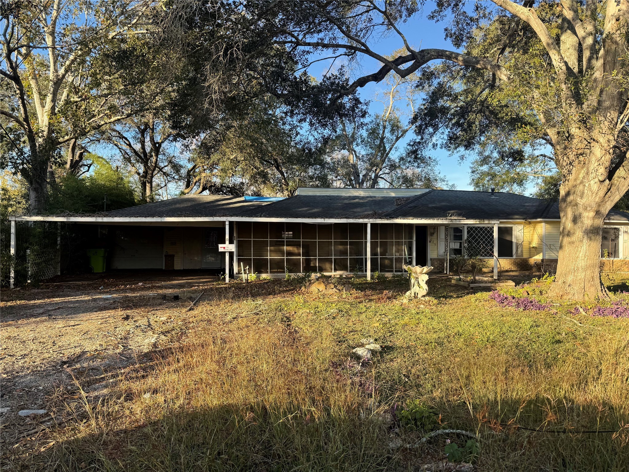 a front view of house with yard space and seating area