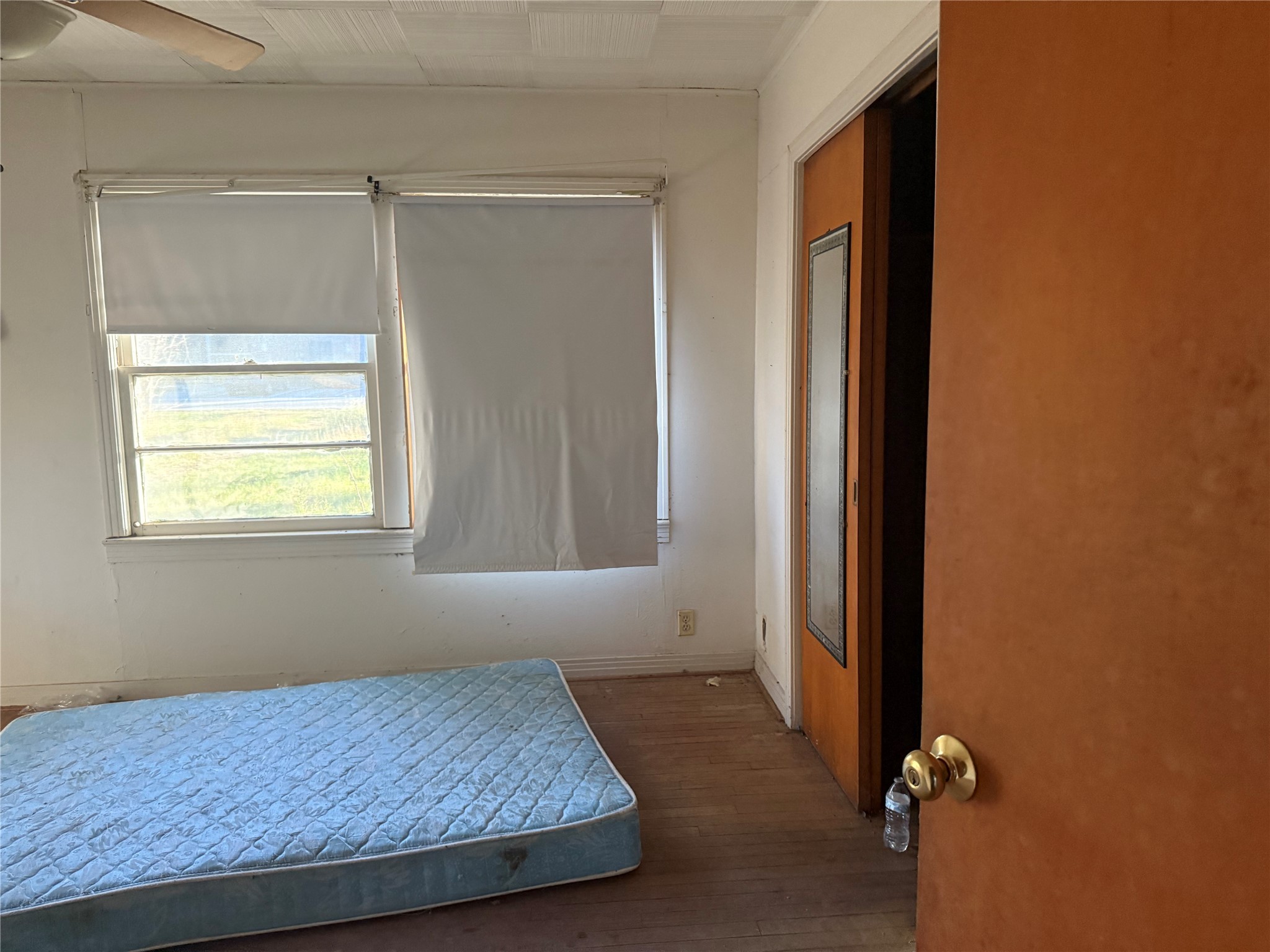 815 Brooks Avenue Rosenberg, TX 77471 - Photo 7 of 7 a room with a bed