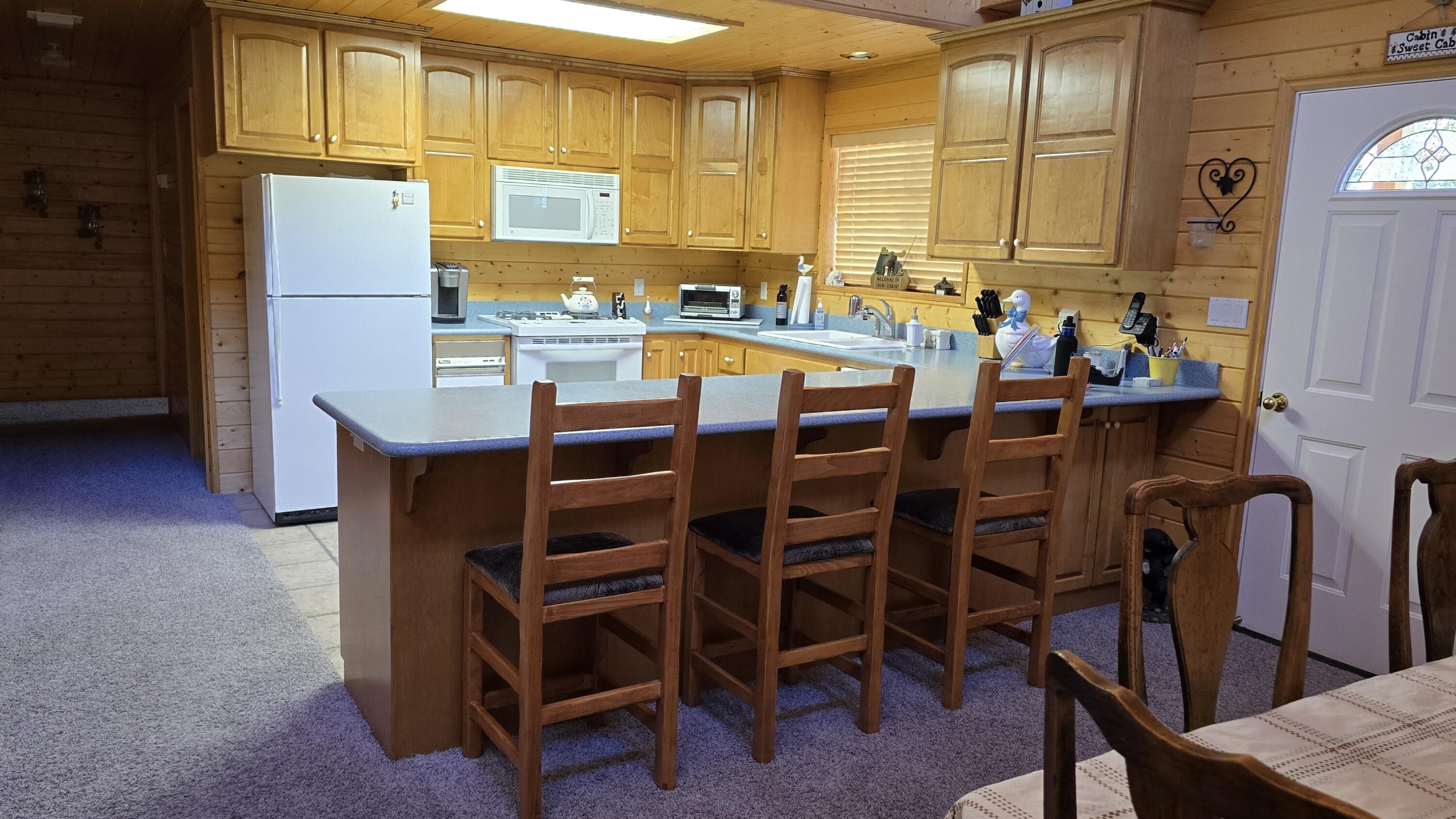650 South Ridge Point Drive Panguitch, UT 84759 - Photo 5 of 38 Kitchen View 2. Extra seating for large groups