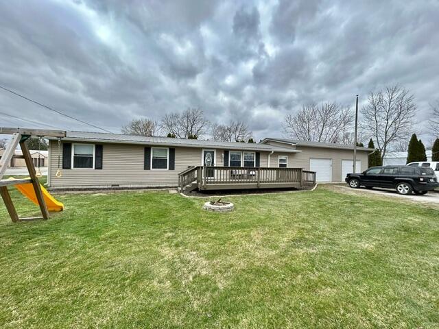 a front view of house with yard and entertaining space
