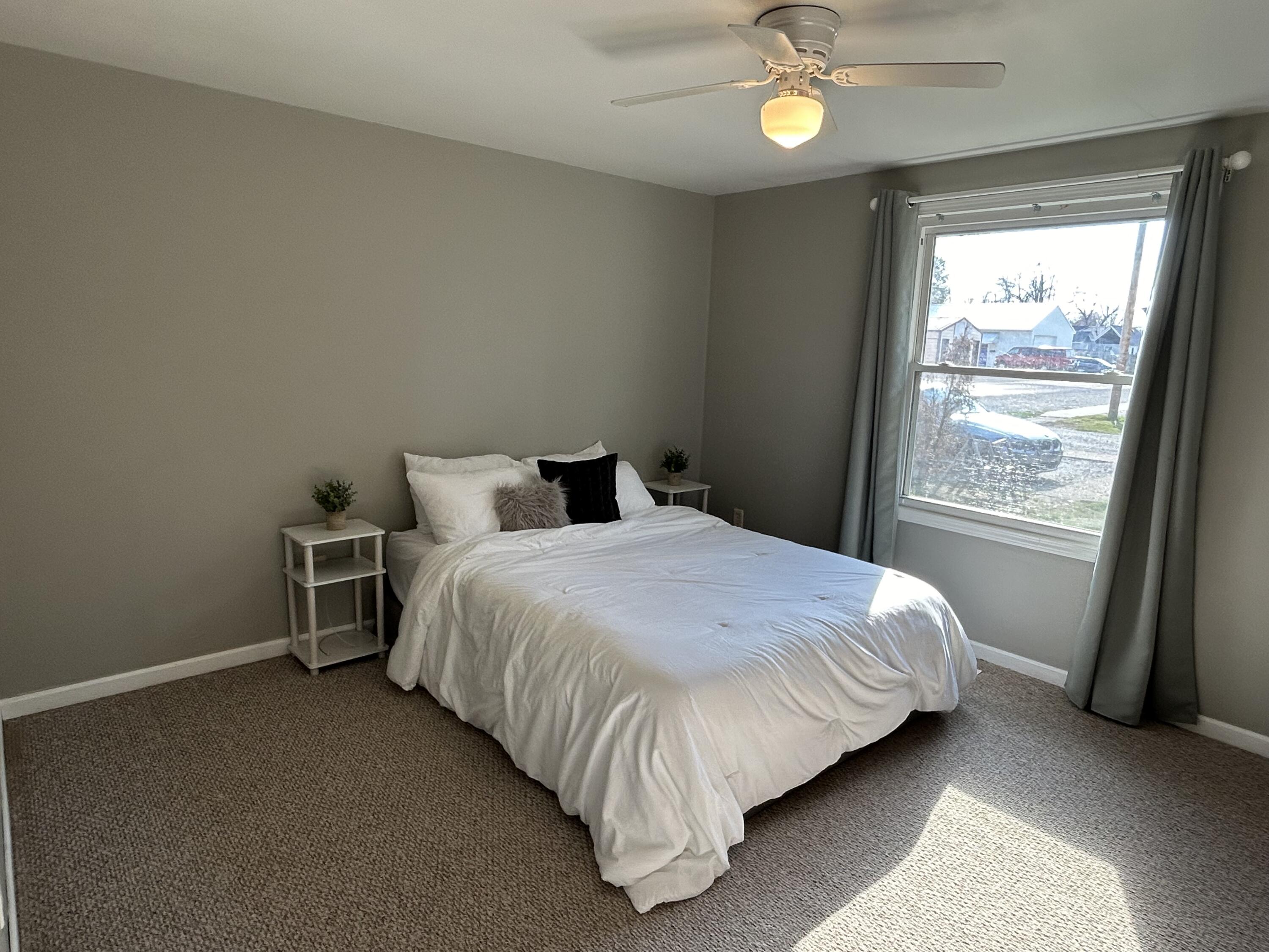 502 North Webster Street Rensselaer, IN 47978 - Photo 12 of 35 a bedroom with a bed and a window