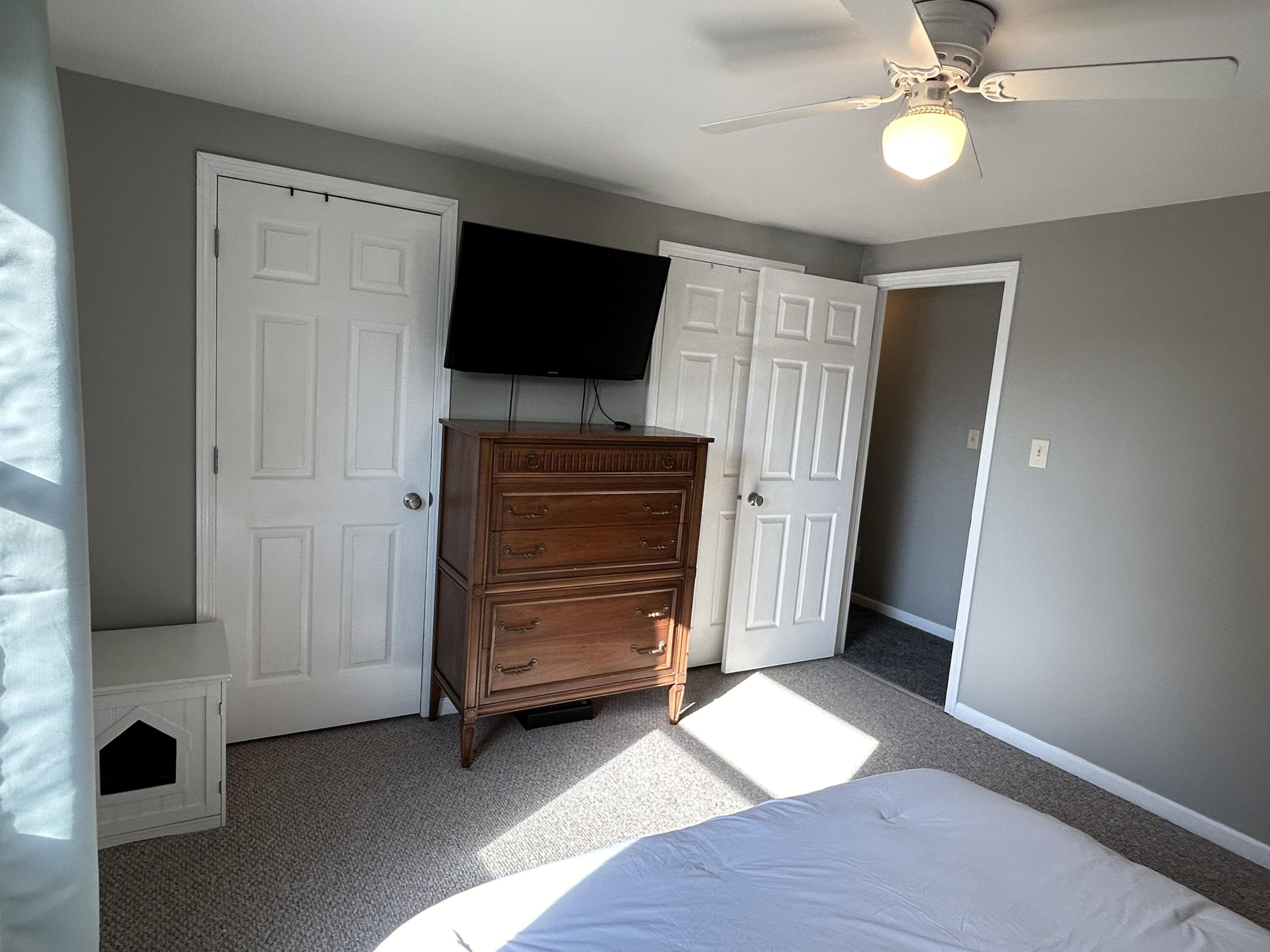 502 North Webster Street Rensselaer, IN 47978 - Photo 13 of 35 a view of room with hardwood floor and a ceiling fan