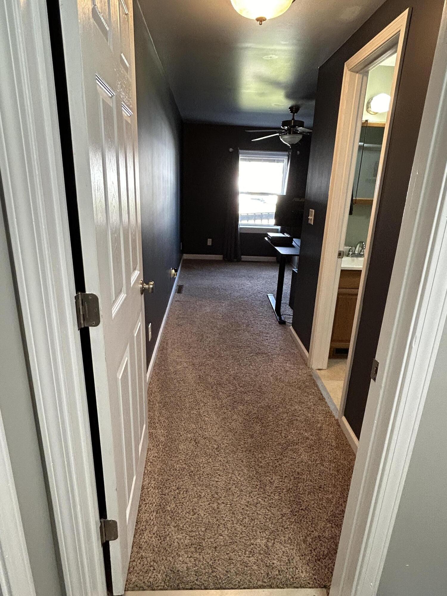 502 North Webster Street Rensselaer, IN 47978 - Photo 20 of 35 a view of a hallway with furniture and a window