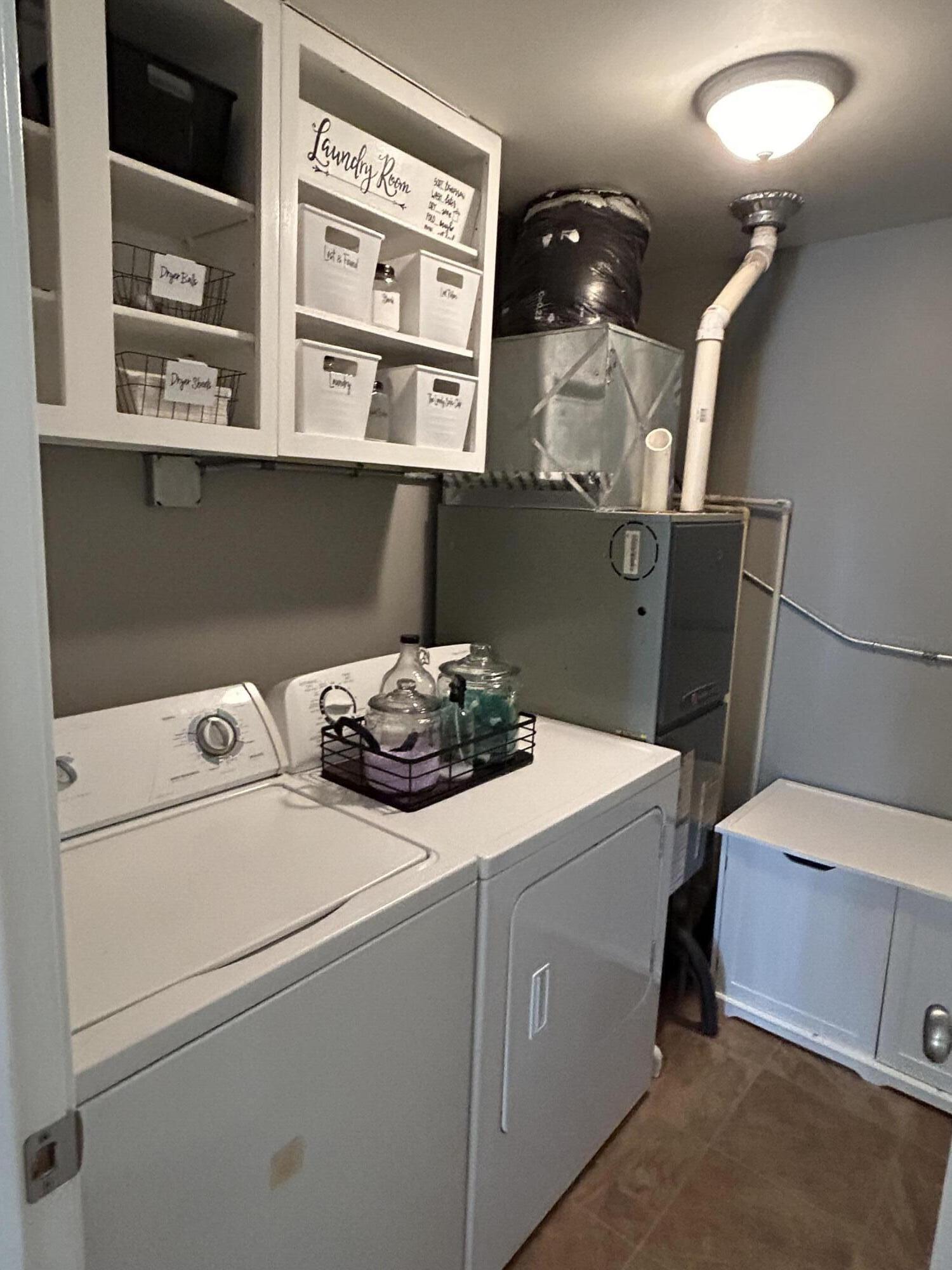 502 North Webster Street Rensselaer, IN 47978 - Photo 9 of 35 a utility room with dryer and washer