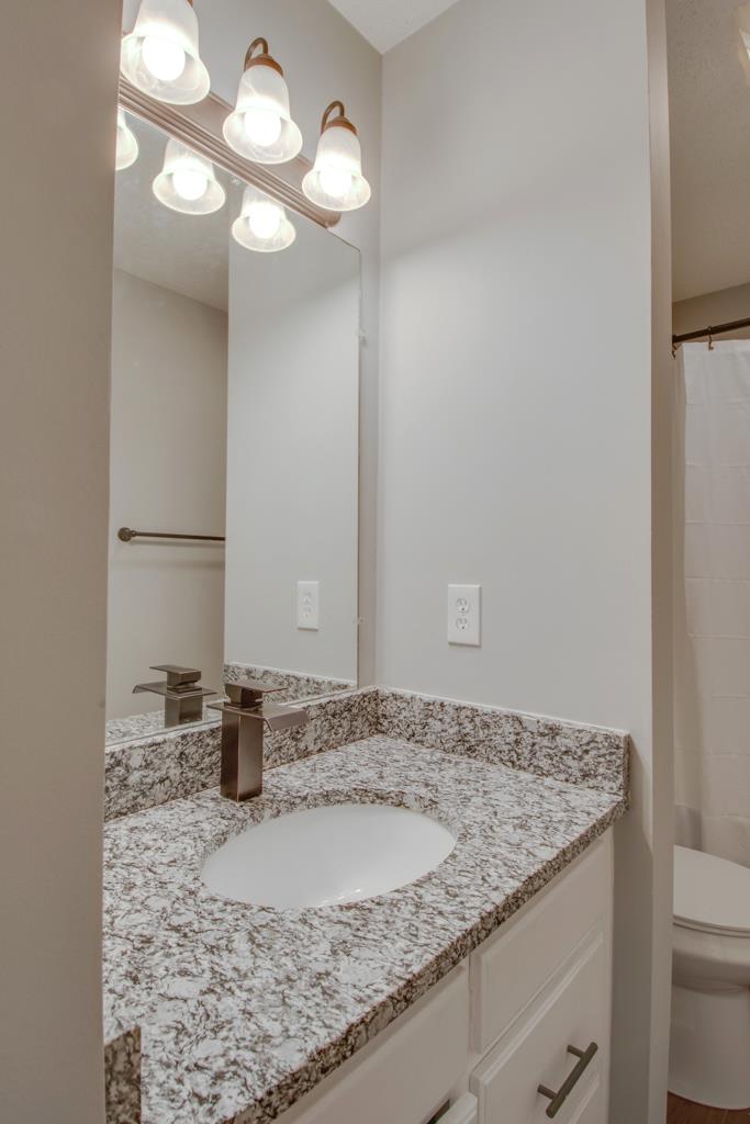 6348 Wayside Road Christiana, TN 37037 - Photo 8 of 19 These bathrooms are just gorgeous. Everything is luxurious. Bronze fixtures and granite.