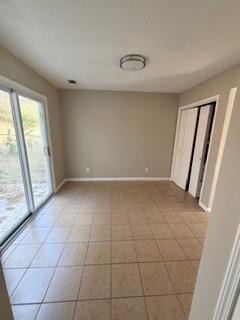 1725 Sturgeon Road Buford, GA 30518 - Photo 8 of 14 a view of an empty room with a window