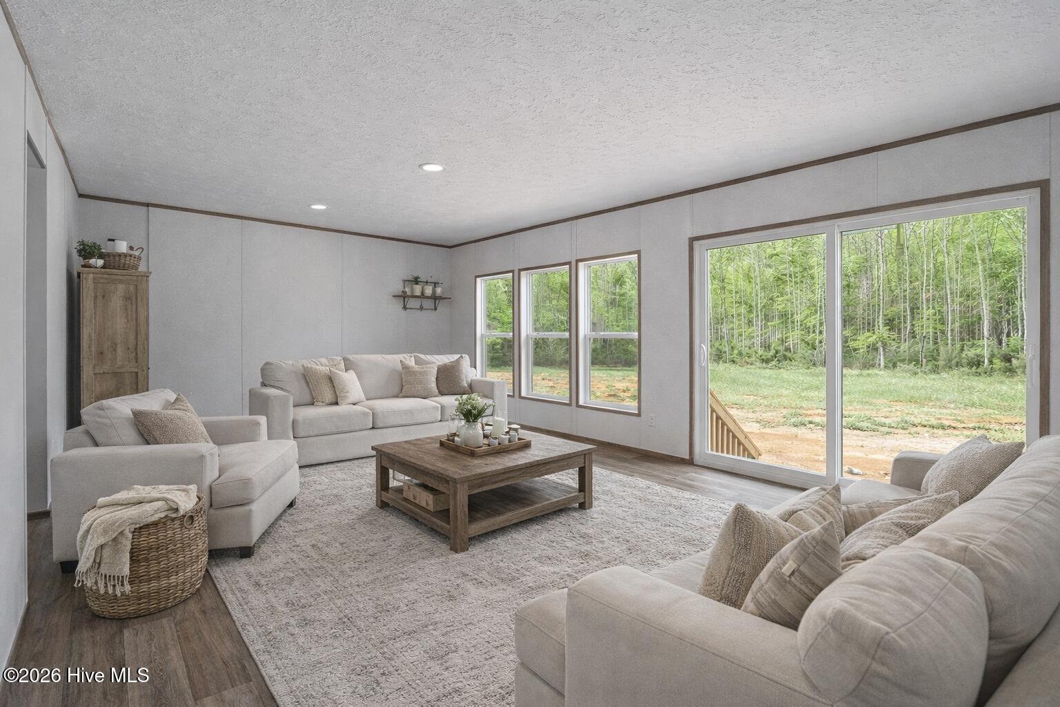 1755 Lynch Road Hollister, NC 27844 - Photo 9 of 35 Cozy family room with forest view