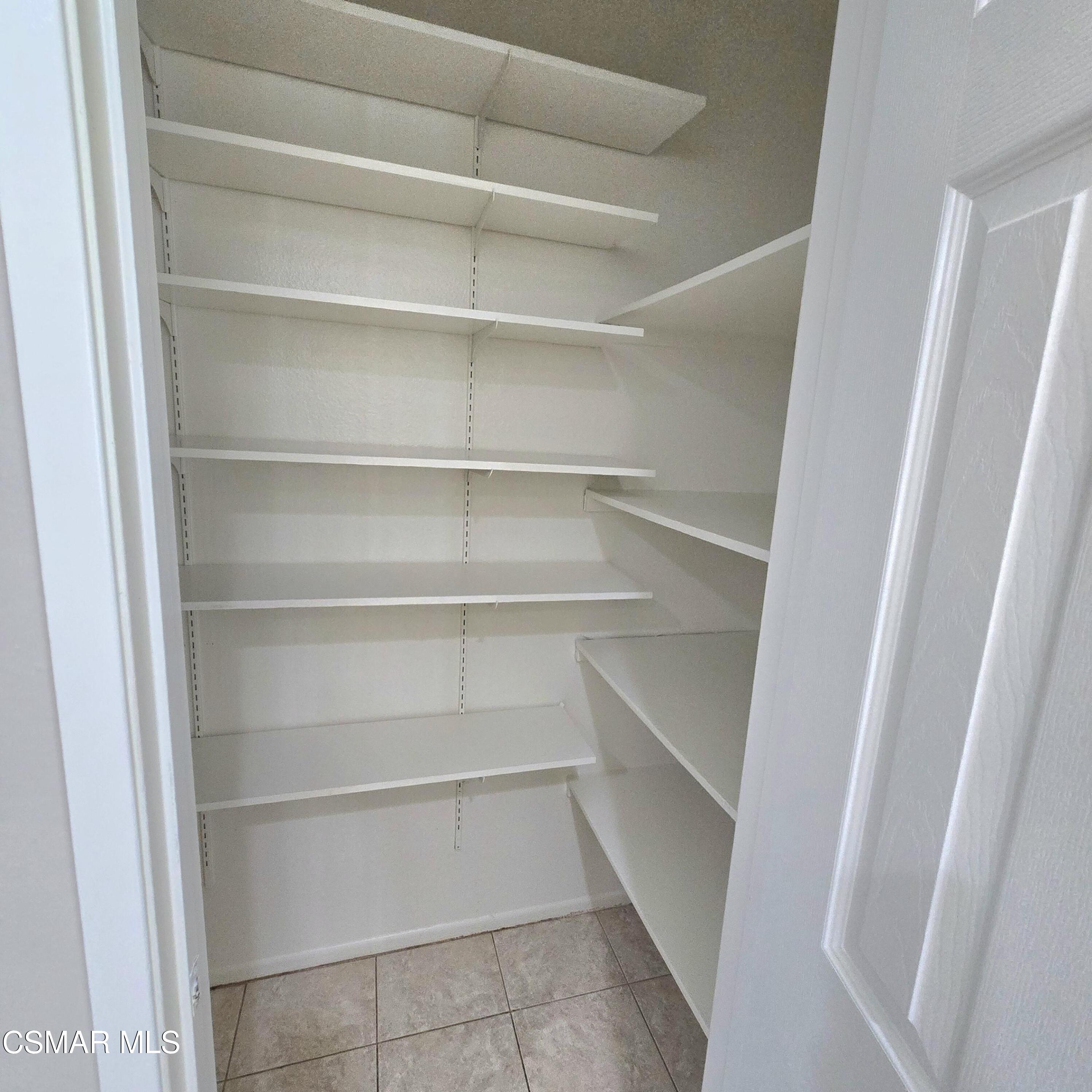 13568 East Quail Summit Road Moorpark, CA 93021 - Photo 5 of 20 a view of walk in closet with empty racks