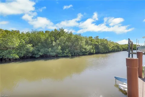 a view of a lake with a city