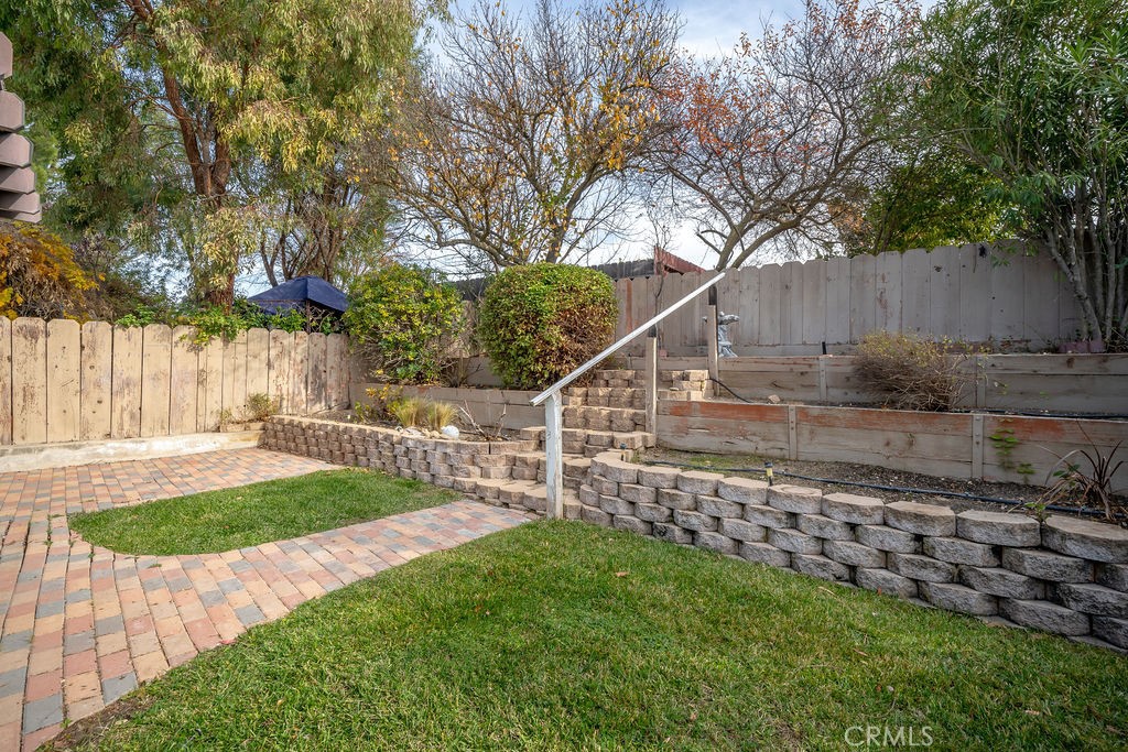1766 Shepherd Drive Paso Robles, CA 93446 - Photo 22 of 29 a view of a backyard with wooden fence
