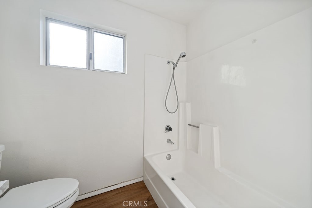 1766 Shepherd Drive Paso Robles, CA 93446 - Photo 29 of 29 a bathroom with a toilet and shower