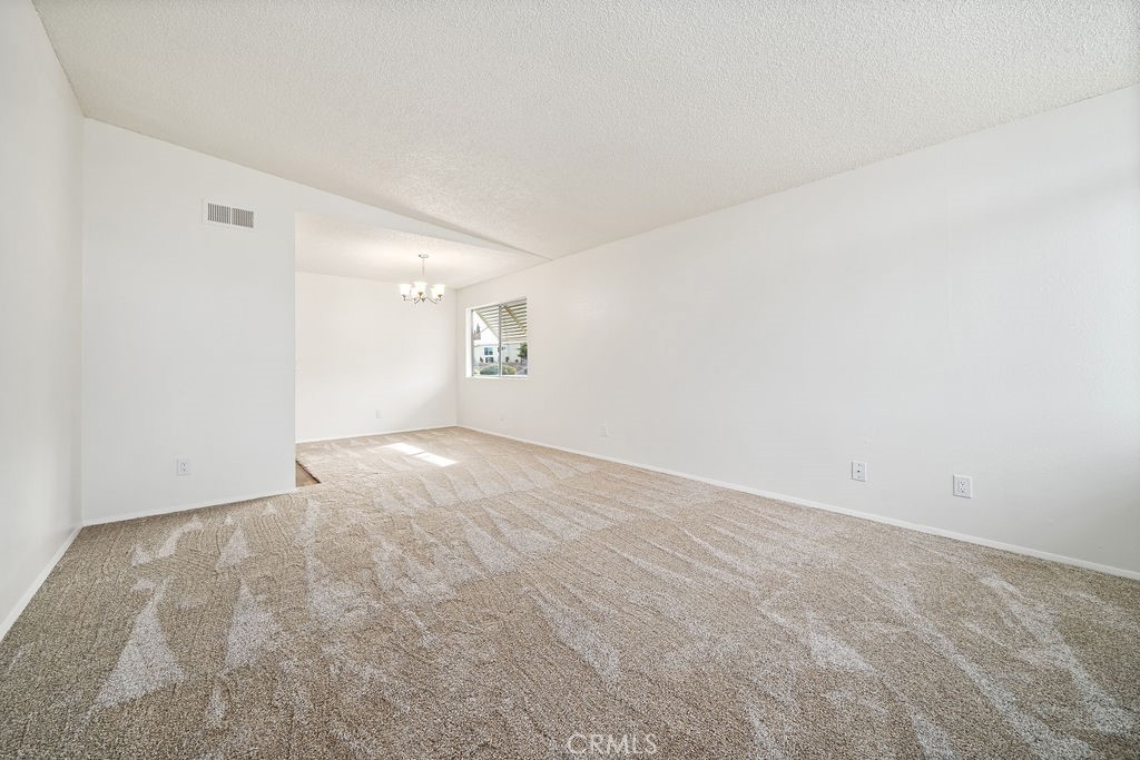 1766 Shepherd Drive Paso Robles, CA 93446 - Photo 3 of 29 an empty room with a natural light