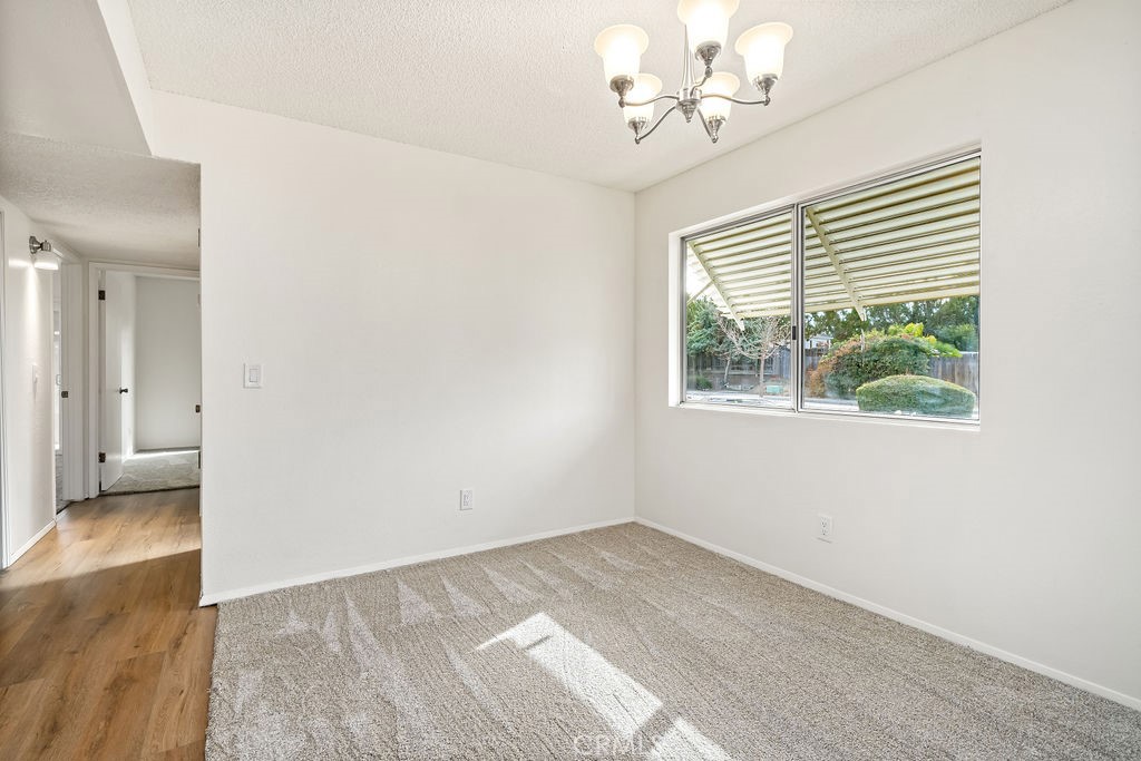 1766 Shepherd Drive Paso Robles, CA 93446 - Photo 6 of 29 wooden floor in an empty room with a window