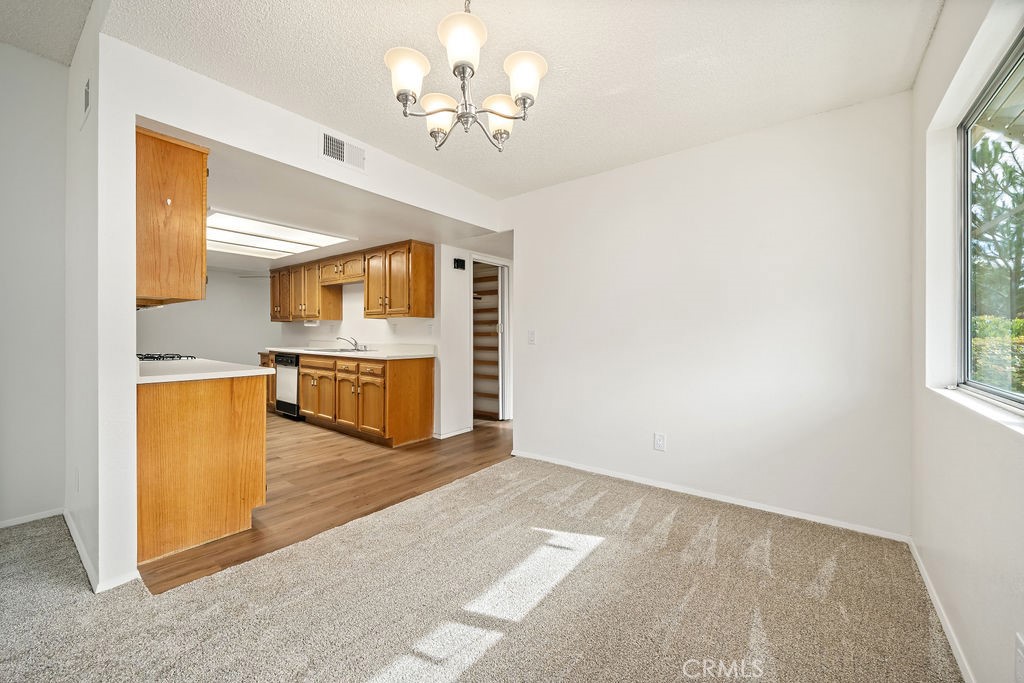 1766 Shepherd Drive Paso Robles, CA 93446 - Photo 7 of 29 an empty room with a kitchen view and a window