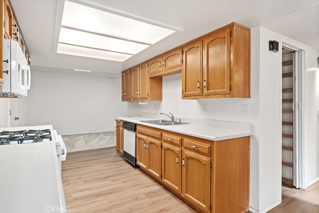 1766 Shepherd Drive Paso Robles, CA 93446 - Photo 10 of 29 a kitchen with stainless steel appliances granite countertop a sink stove and cabinets