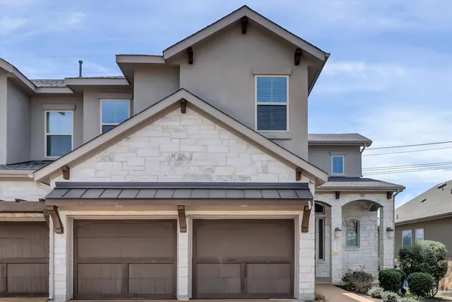 a view of a house with garage