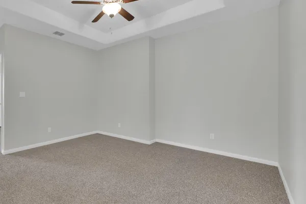 a bathroom with a shower and a sink