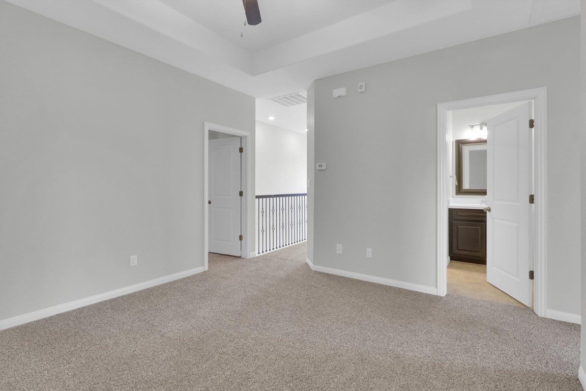 201 Cartwheel Bend, Unit 30 Austin, TX 78738 - Photo 17 of 40 an empty room with closet area