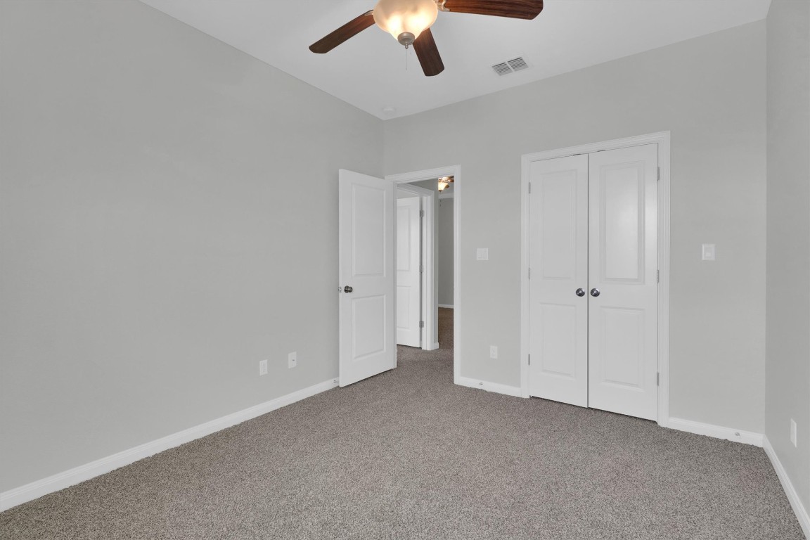 201 Cartwheel Bend, Unit 30 Austin, TX 78738 - Photo 24 of 40 wooden floor in an empty room