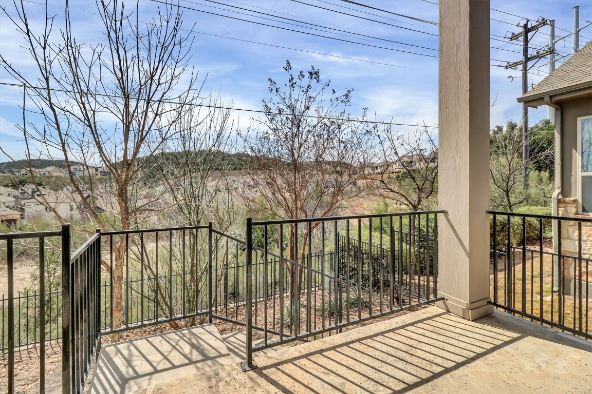 201 Cartwheel Bend, Unit 30 Austin, TX 78738 - Photo 27 of 40 a view of balcony with wooden floor