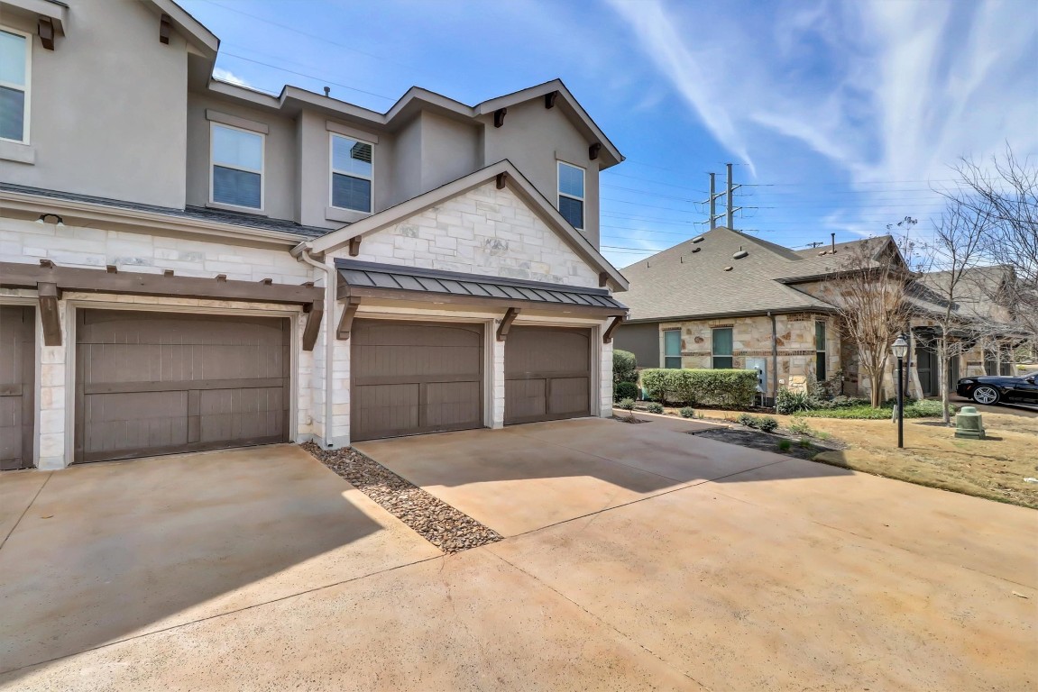 201 Cartwheel Bend, Unit 30 Austin, TX 78738 - Photo 32 of 40 a view of a house with entertaining space