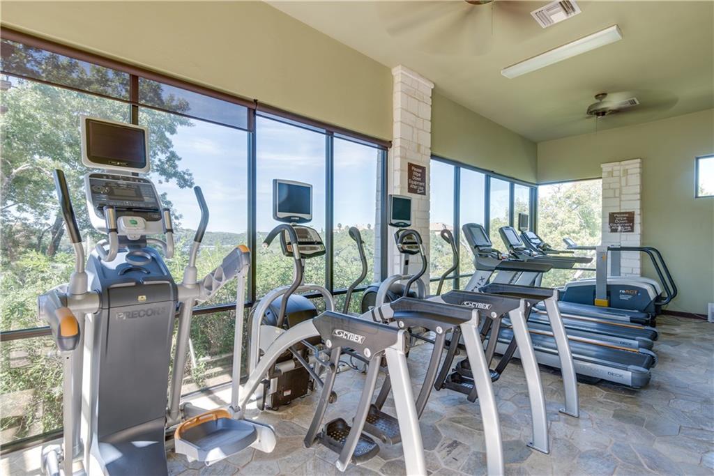 201 Cartwheel Bend, Unit 30 Austin, TX 78738 - Photo 36 of 40 a view of a room with gym equipment