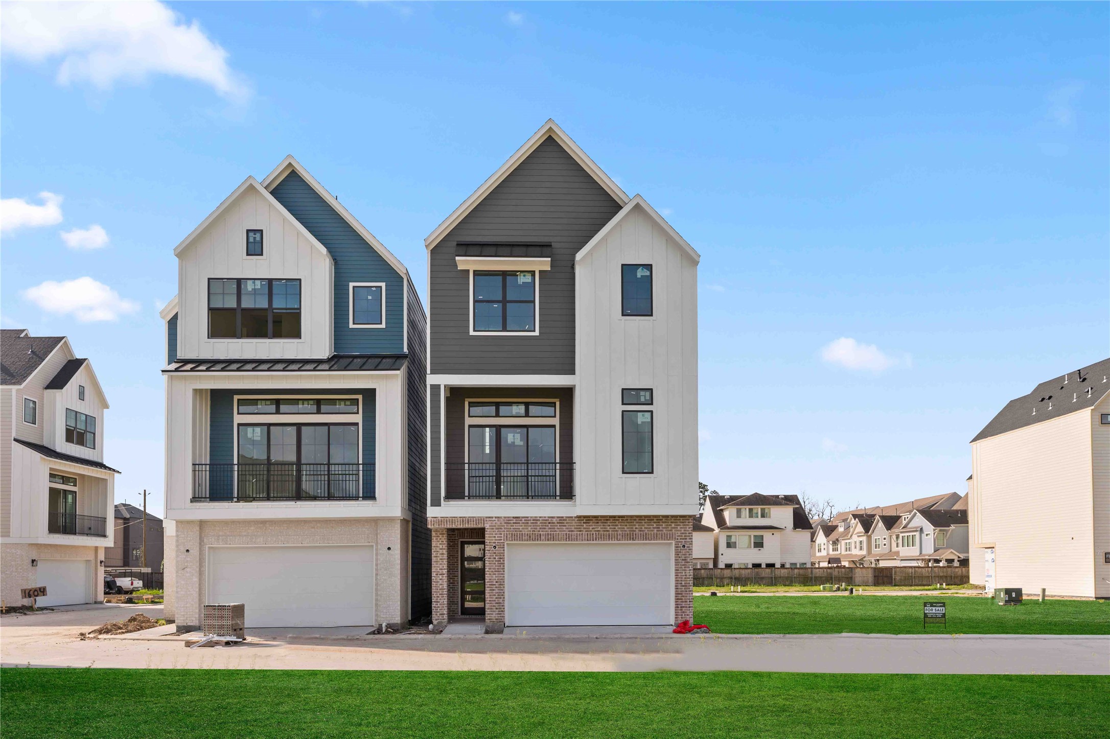 8705 Cosenza Lane Houston, TX 77055 - Photo 1 of 12 a front view of a house with a yard and garage