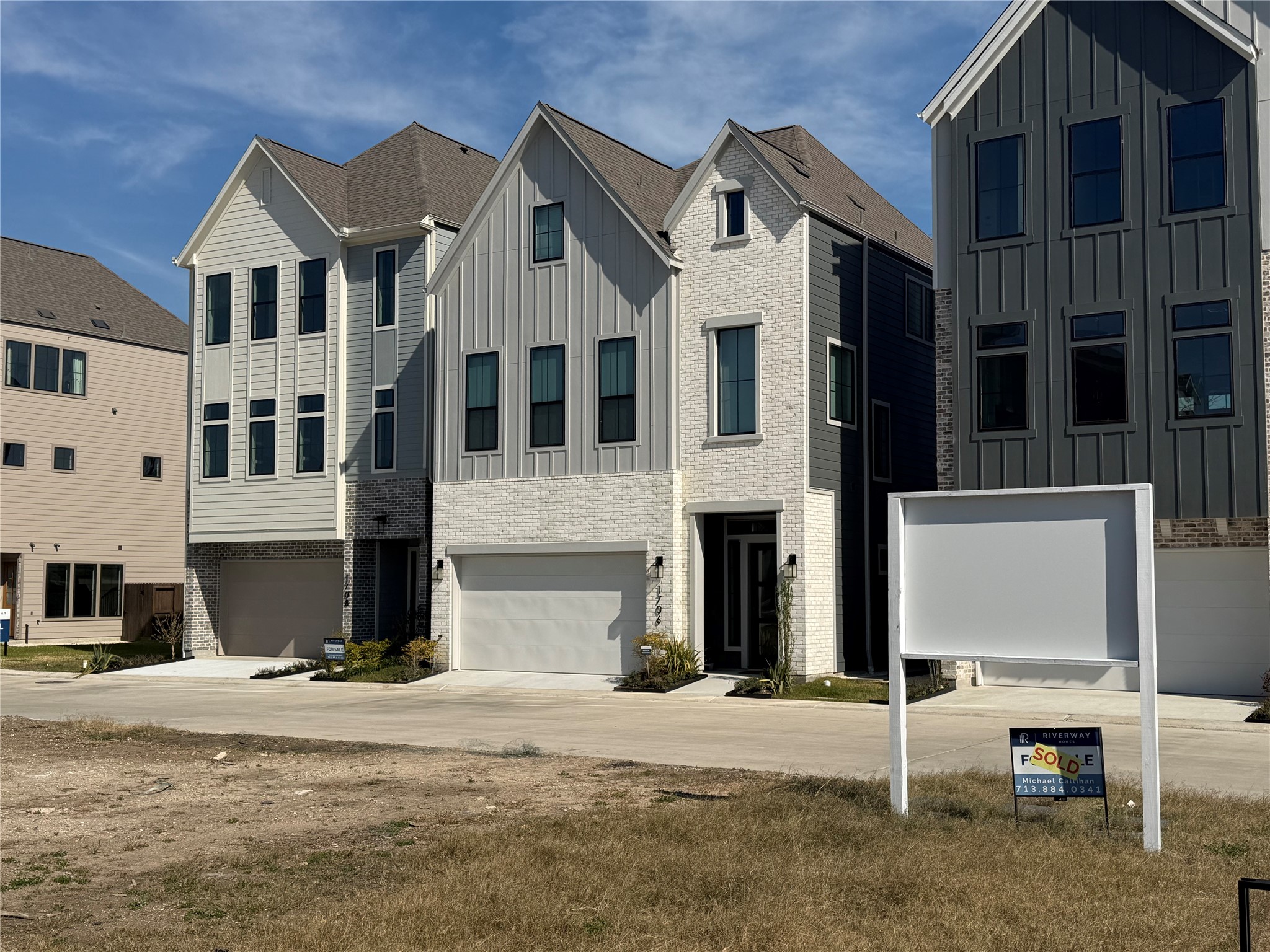 8705 Cosenza Lane Houston, TX 77055 - Photo 12 of 12 a view of a white building among the street