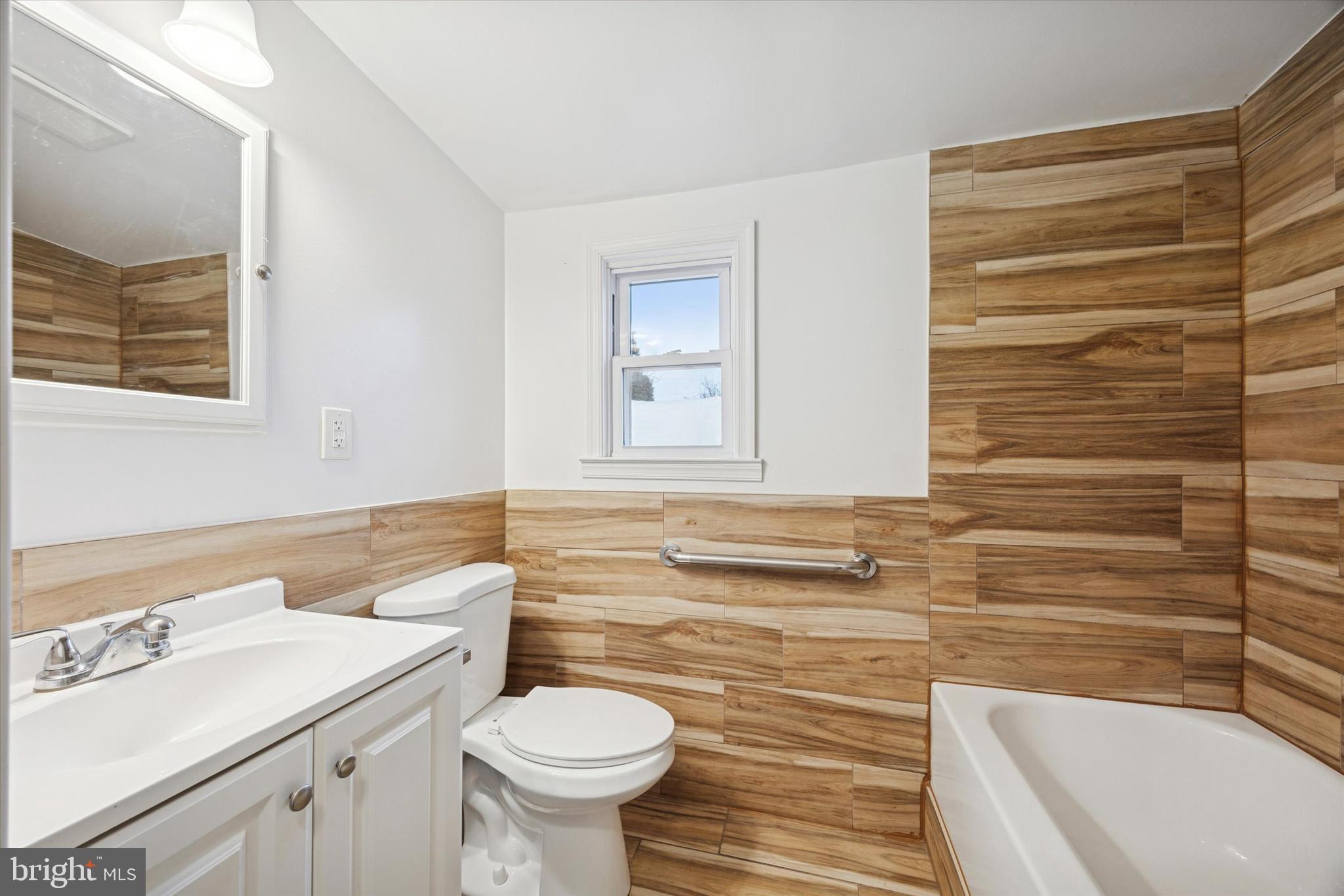 68 South Union Avenue Lansdowne, PA 19050 - Photo 11 of 15 a bathroom with a sink and a mirror