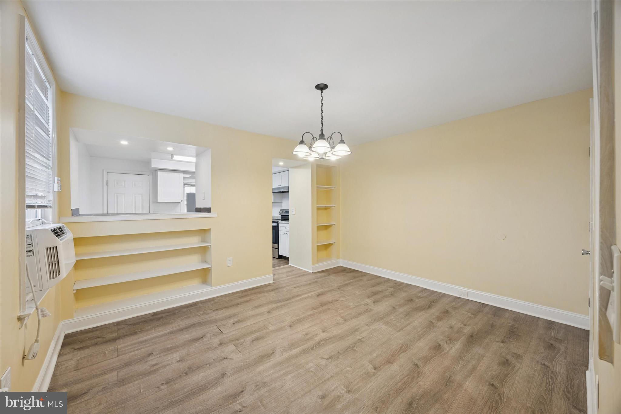 68 South Union Avenue Lansdowne, PA 19050 - Photo 5 of 15 wooden floor in an empty room with a window