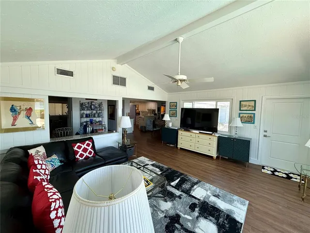 a kitchen with appliances cabinets and a sink