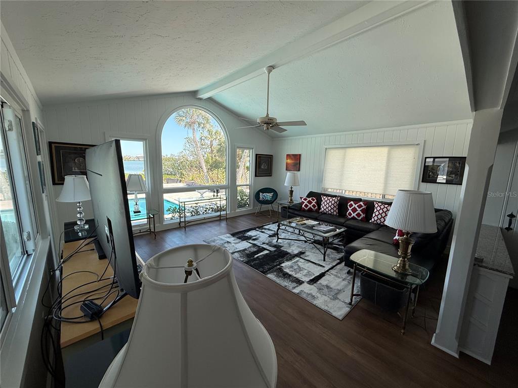 3534 Casey Key Road Nokomis, FL 34275 - Photo 12 of 55 a living room with furniture and a large window