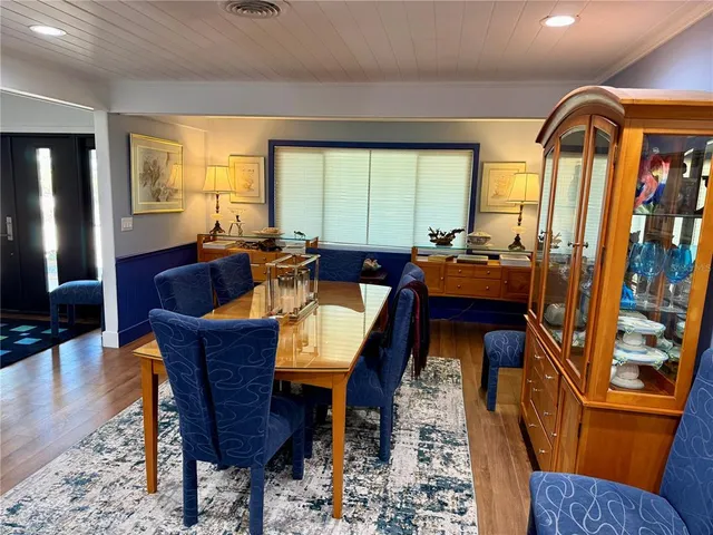 a bed room with a bed and a television