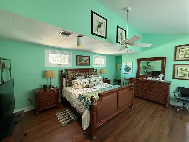a bathroom with a sink mirror bathtub and toilet