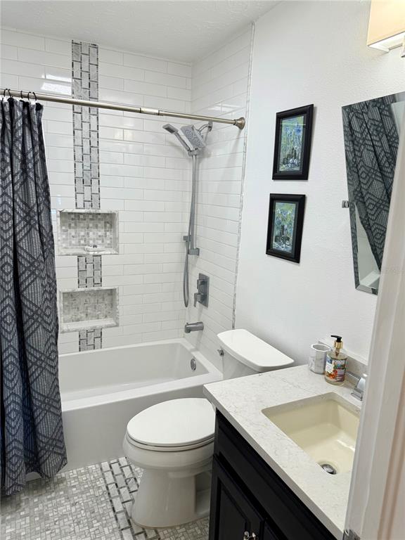 3534 Casey Key Road Nokomis, FL 34275 - Photo 37 of 55 a bathroom with a sink a toilet and shower