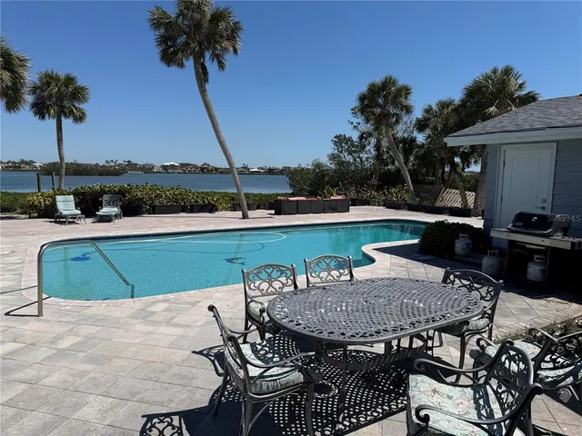 a view of a lake from a yard