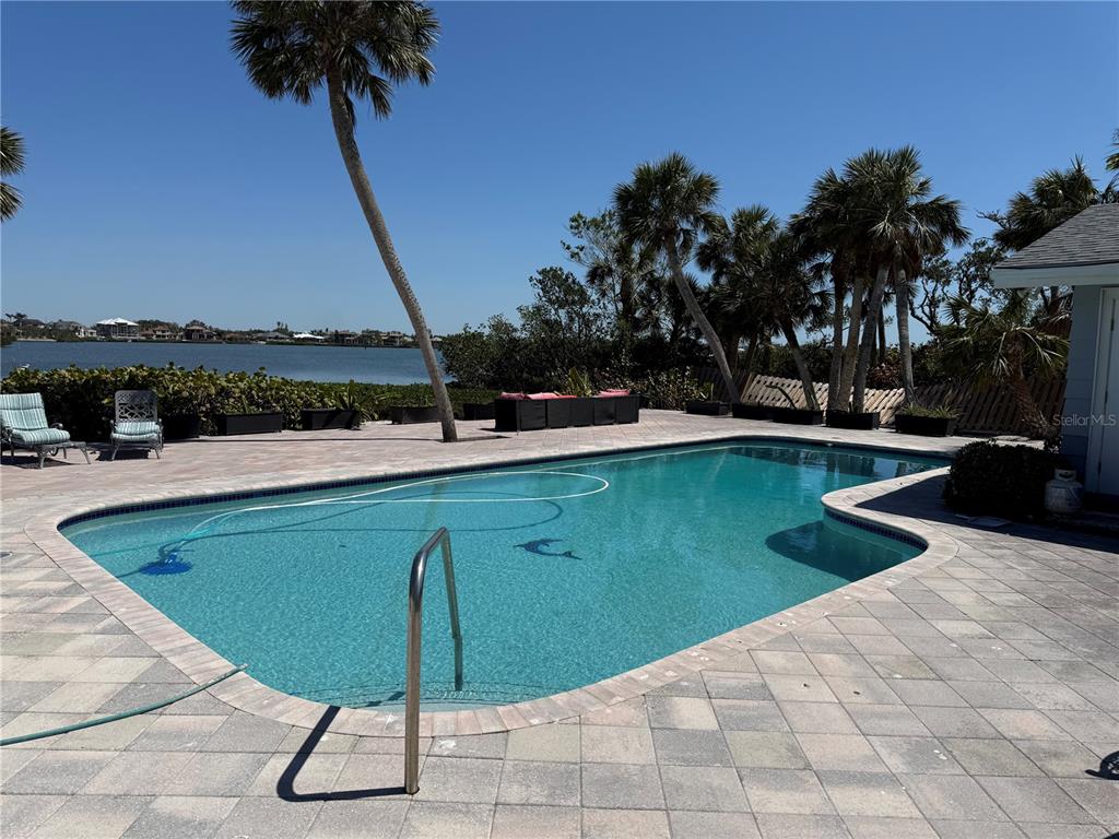3534 Casey Key Road Nokomis, FL 34275 - Photo 51 of 55 a view of a lake with a swimming pool