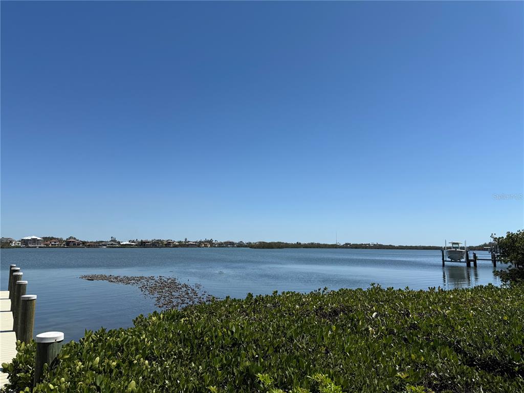 3534 Casey Key Road Nokomis, FL 34275 - Photo 55 of 55 a view of a lake from a yard