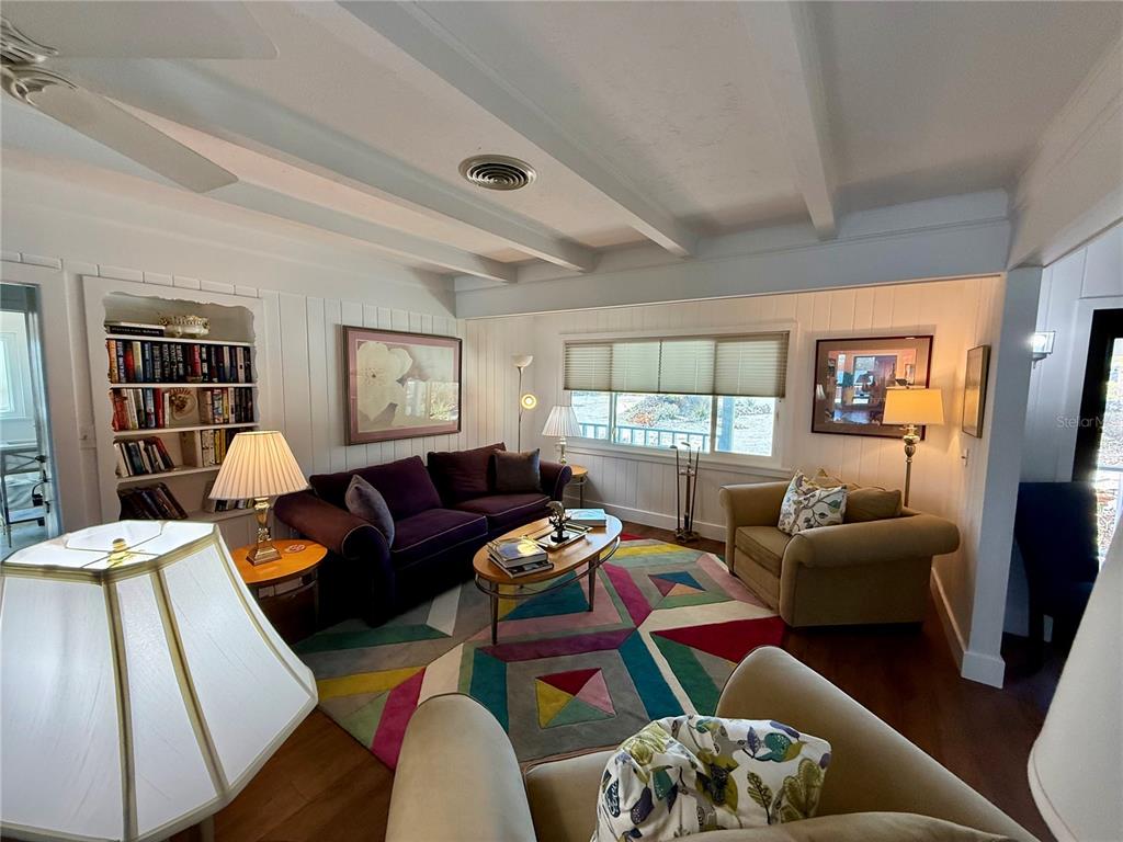 3534 Casey Key Road Nokomis, FL 34275 - Photo 7 of 55 a living room with furniture and a window