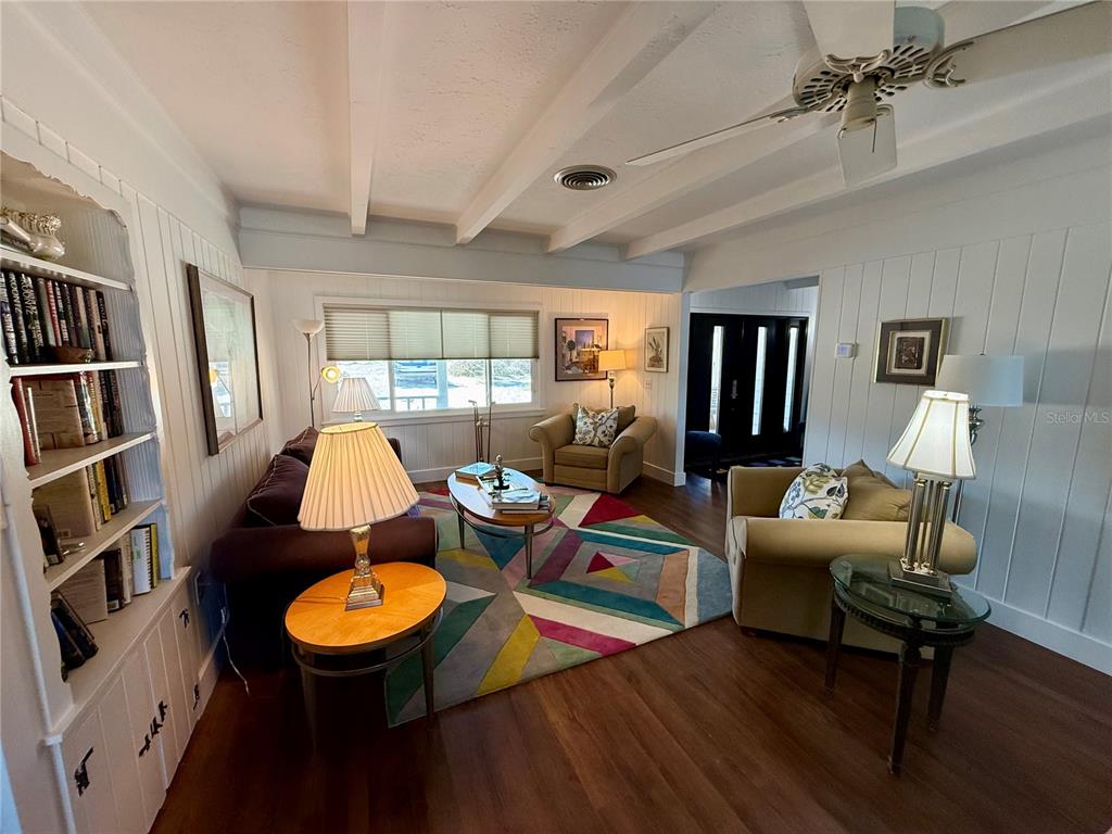 3534 Casey Key Road Nokomis, FL 34275 - Photo 10 of 55 a living room with furniture and a table