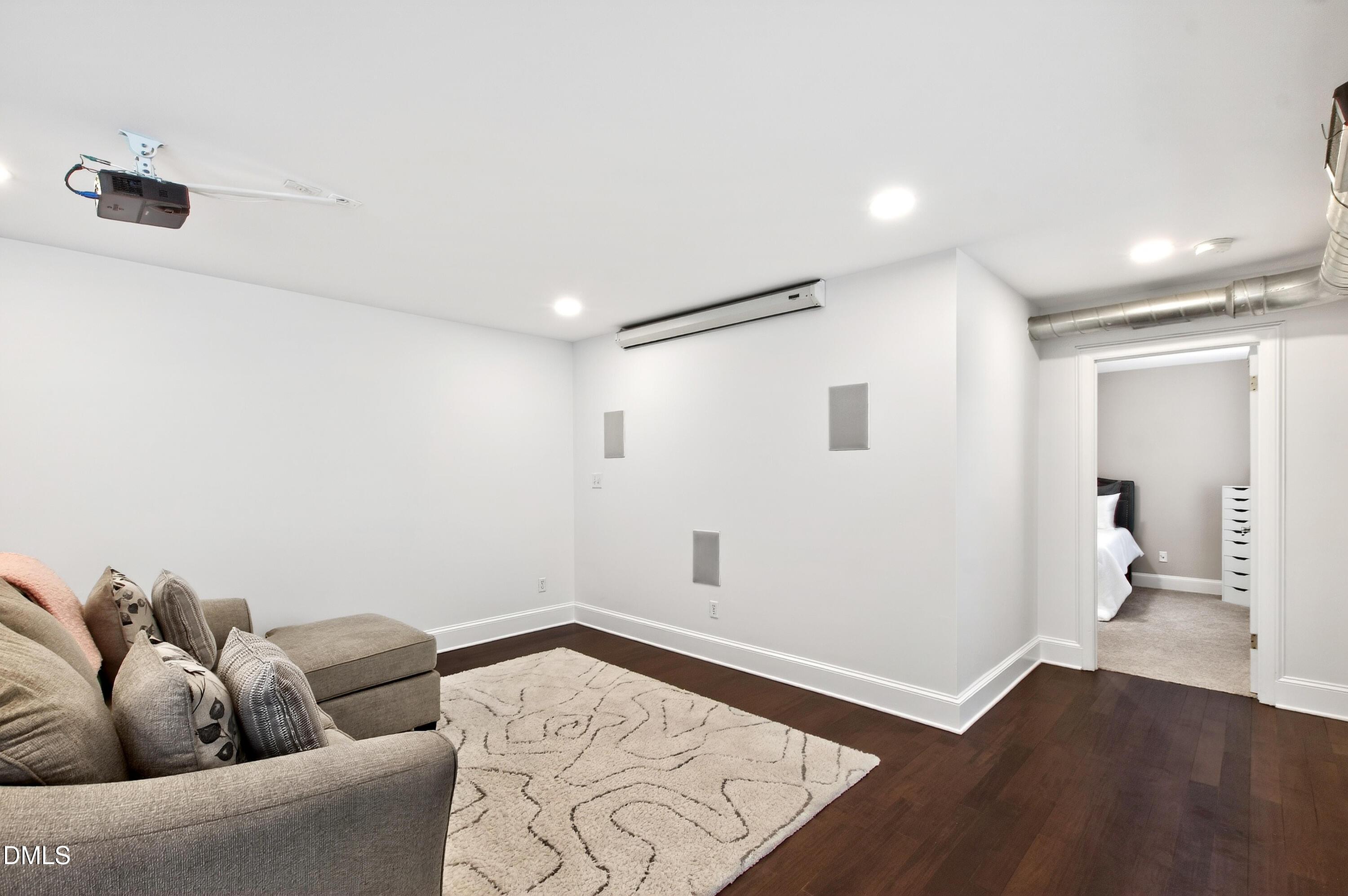 2204 Stafford Avenue, Unit 202 Raleigh, NC 27607 - Photo 5 of 34 a living room with furniture and wooden floor