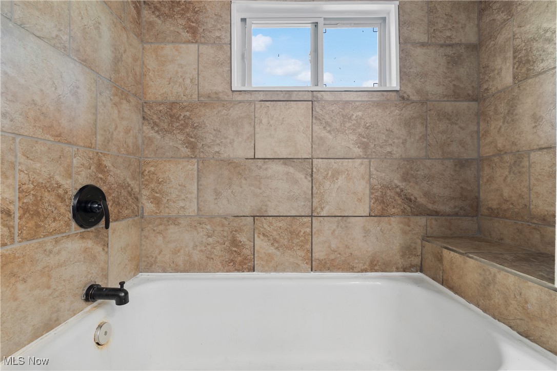 427 Center Road Akron, OH 44319 - Photo 19 of 39 Bathroom on main level with tile shower